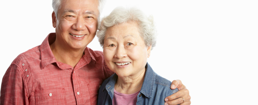 Studio Shot Of Chinese Senior Couple